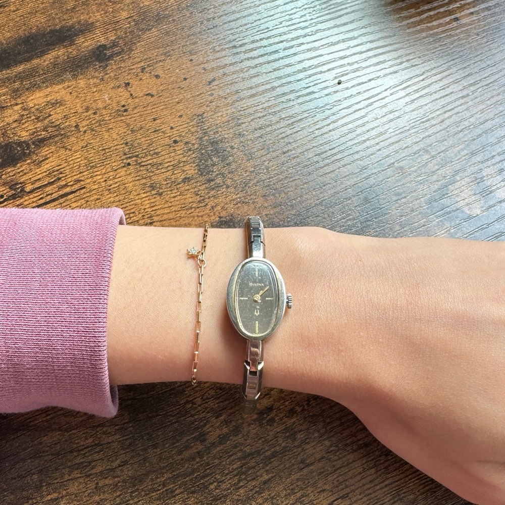 Bulova gold watch, fits a small wrist, good condition